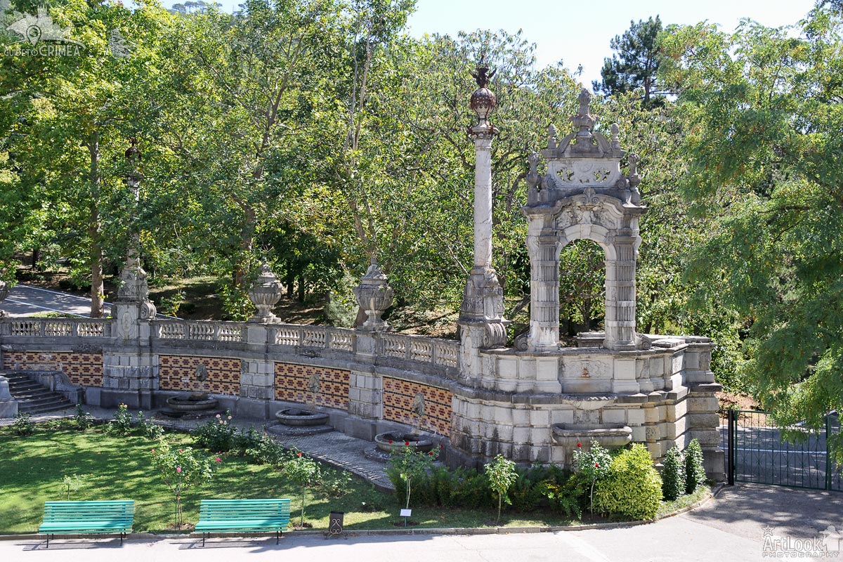 Columns and Curved Stone Wall with Fountains